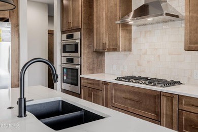 You will love this gorgeous 5-bedroom home with a spacious on Headwaters Golf Course At Granby Ranch in Colorado - for sale on GolfHomes.com, golf home, golf lot