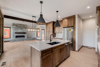 You will love this gorgeous 5-bedroom home with a spacious on Headwaters Golf Course At Granby Ranch in Colorado - for sale on GolfHomes.com, golf home, golf lot