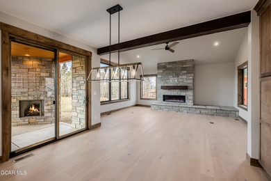 You will love this gorgeous 5-bedroom home with a spacious on Headwaters Golf Course At Granby Ranch in Colorado - for sale on GolfHomes.com, golf home, golf lot