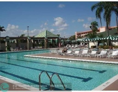 DON'T MISS OUT ON THIS OPPORTUNITY! THIS FURNISHED CONDO IS 2 on Wynmoor Golf Course in Florida - for sale on GolfHomes.com, golf home, golf lot