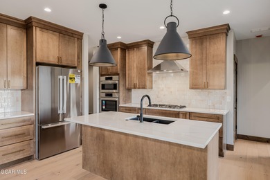 You will love this gorgeous 5-bedroom home with a spacious on Headwaters Golf Course At Granby Ranch in Colorado - for sale on GolfHomes.com, golf home, golf lot