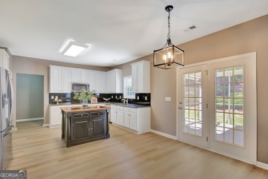 Welcome to this stunning home in the highly sought-after on Braelinn Golf Club in Georgia - for sale on GolfHomes.com, golf home, golf lot