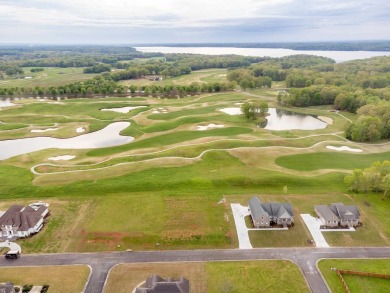 Positioned on a .47-acre lot adjacent to the renowned Fighting on The Shoals Golf Club in Alabama - for sale on GolfHomes.com, golf home, golf lot