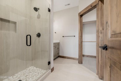 You will love this gorgeous 5-bedroom home with a spacious on Headwaters Golf Course At Granby Ranch in Colorado - for sale on GolfHomes.com, golf home, golf lot