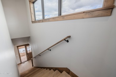 You will love this gorgeous 5-bedroom home with a spacious on Headwaters Golf Course At Granby Ranch in Colorado - for sale on GolfHomes.com, golf home, golf lot