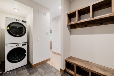 You will love this gorgeous 5-bedroom home with a spacious on Headwaters Golf Course At Granby Ranch in Colorado - for sale on GolfHomes.com, golf home, golf lot