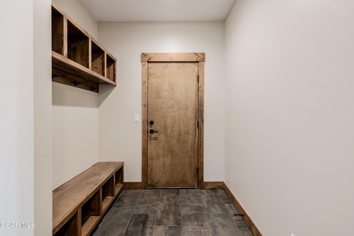 You will love this gorgeous 5-bedroom home with a spacious on Headwaters Golf Course At Granby Ranch in Colorado - for sale on GolfHomes.com, golf home, golf lot