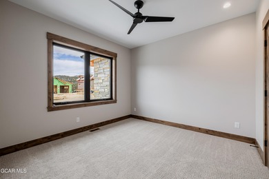 You will love this gorgeous 5-bedroom home with a spacious on Headwaters Golf Course At Granby Ranch in Colorado - for sale on GolfHomes.com, golf home, golf lot