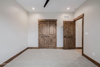 You will love this gorgeous 5-bedroom home with a spacious on Headwaters Golf Course At Granby Ranch in Colorado - for sale on GolfHomes.com, golf home, golf lot
