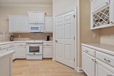 Welcome to this beautifully maintained 3-bedroom, 2-bath home on Pelican Point Golf Club in Louisiana - for sale on GolfHomes.com, golf home, golf lot