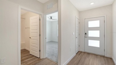 Welcome to your dream home at 17119 Barnwood, nestled in the on Esplanade Golf and Country at Lakewood Ranch in Florida - for sale on GolfHomes.com, golf home, golf lot