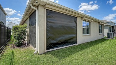 Welcome to your dream home at 17119 Barnwood, nestled in the on Esplanade Golf and Country at Lakewood Ranch in Florida - for sale on GolfHomes.com, golf home, golf lot