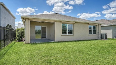 Welcome to your dream home at 17119 Barnwood, nestled in the on Esplanade Golf and Country at Lakewood Ranch in Florida - for sale on GolfHomes.com, golf home, golf lot