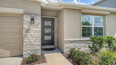 Welcome to your dream home at 17119 Barnwood, nestled in the on Esplanade Golf and Country at Lakewood Ranch in Florida - for sale on GolfHomes.com, golf home, golf lot