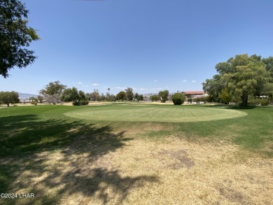 How about a home in the center of Bullhead City sitting on the on Chaparral Golf and Country Club in Arizona - for sale on GolfHomes.com, golf home, golf lot