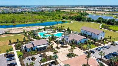 Welcome to your dream home at 17119 Barnwood, nestled in the on Esplanade Golf and Country at Lakewood Ranch in Florida - for sale on GolfHomes.com, golf home, golf lot