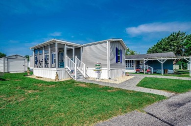 Looking for an affordable beach retreat that's move-in ready in on Barefoot Resort and Golf Club  in South Carolina - for sale on GolfHomes.com, golf home, golf lot