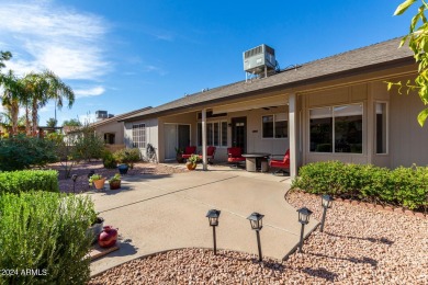 Experience Arizona's breathtaking sunsets in this beautifully on SunBird Golf Club in Arizona - for sale on GolfHomes.com, golf home, golf lot