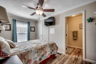 Looking for an affordable beach retreat that's move-in ready in on Barefoot Resort and Golf Club  in South Carolina - for sale on GolfHomes.com, golf home, golf lot