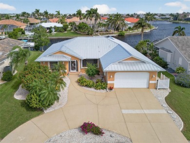 PUNTA GORDA ISLES! EXCEPTIONAL 3 BEDROOM, 2 BATH, 2-CAR GARAGE on Saint Andrews South Golf Club in Florida - for sale on GolfHomes.com, golf home, golf lot