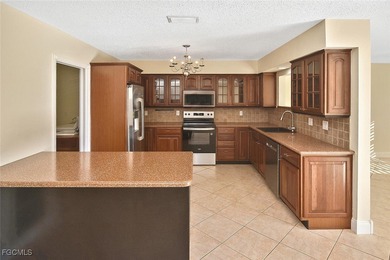 Welcome to luxury lakefront living in the heart of Stratford on Cypress Lake Country Club in Florida - for sale on GolfHomes.com, golf home, golf lot