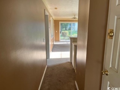 Opportunity Knocks Near the Coast! This 2-bedroom, 2-bath on  in South Carolina - for sale on GolfHomes.com, golf home, golf lot