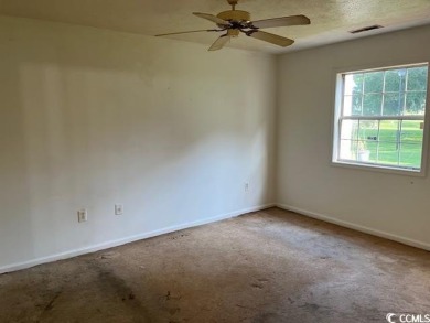 Opportunity Knocks Near the Coast! This 2-bedroom, 2-bath on  in South Carolina - for sale on GolfHomes.com, golf home, golf lot