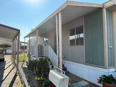 Welcome to this spacious 1,200 square foot manufactured home on Arroyo Fairways Club and Golf Course in California - for sale on GolfHomes.com, golf home, golf lot