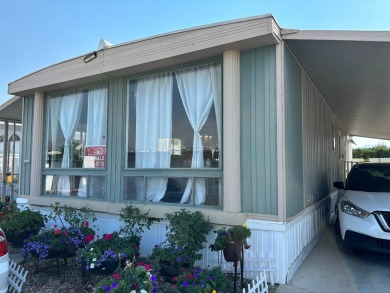 Welcome to this spacious 1,200 square foot manufactured home on Arroyo Fairways Club and Golf Course in California - for sale on GolfHomes.com, golf home, golf lot