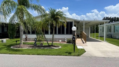 This home is located in the upscale 55+ gated community - The on Sabal Springs Golf and Racquet Club in Florida - for sale on GolfHomes.com, golf home, golf lot