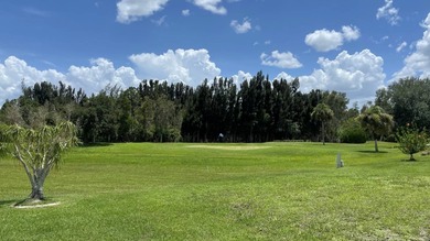 This home is located in the upscale 55+ gated community - The on Sabal Springs Golf and Racquet Club in Florida - for sale on GolfHomes.com, golf home, golf lot