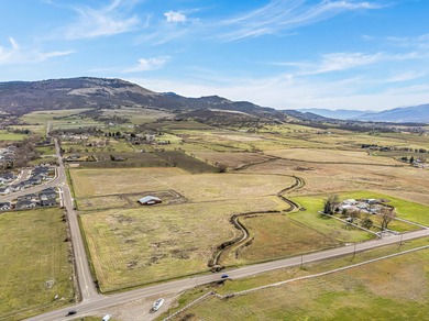 Ideally located in East Medford directly across from Centennial on Centennial Golf Club in Oregon - for sale on GolfHomes.com, golf home, golf lot