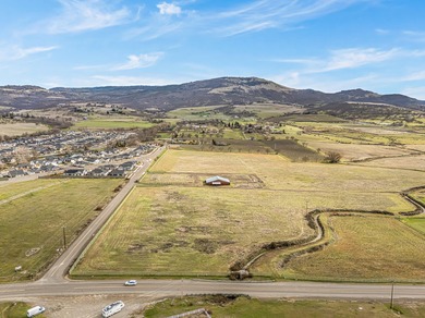 Ideally located in East Medford directly across from Centennial on Centennial Golf Club in Oregon - for sale on GolfHomes.com, golf home, golf lot