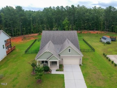 Nestled on a picturesque golf course lot, this thoughtfully on Olde Liberty Golf and Country Club in North Carolina - for sale on GolfHomes.com, golf home, golf lot