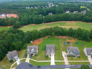 Nestled on a picturesque golf course lot, this thoughtfully on Olde Liberty Golf and Country Club in North Carolina - for sale on GolfHomes.com, golf home, golf lot