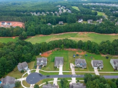 Nestled on a picturesque golf course lot, this thoughtfully on Olde Liberty Golf and Country Club in North Carolina - for sale on GolfHomes.com, golf home, golf lot