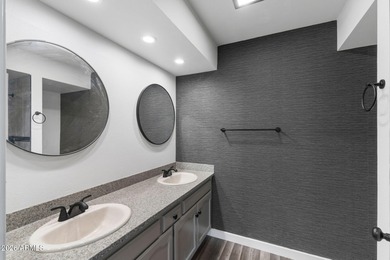 Ideally situated on a corner lot, this stunning home has on Leisure World Country Club in Arizona - for sale on GolfHomes.com, golf home, golf lot