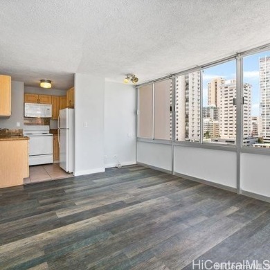 This charming condo has vinyl flooring in the unit with ceramic on Ala Wai Golf Course in Hawaii - for sale on GolfHomes.com, golf home, golf lot