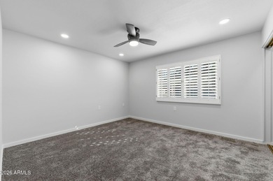 Ideally situated on a corner lot, this stunning home has on Leisure World Country Club in Arizona - for sale on GolfHomes.com, golf home, golf lot