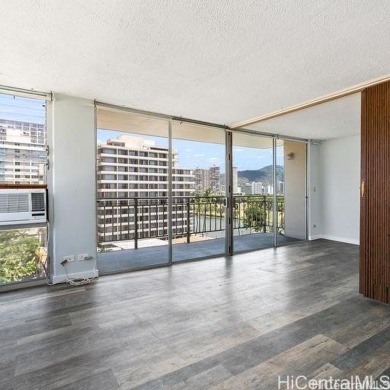 This charming condo has vinyl flooring in the unit with ceramic on Ala Wai Golf Course in Hawaii - for sale on GolfHomes.com, golf home, golf lot