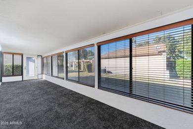 Ideally situated on a corner lot, this stunning home has on Leisure World Country Club in Arizona - for sale on GolfHomes.com, golf home, golf lot