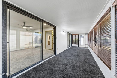 Ideally situated on a corner lot, this stunning home has on Leisure World Country Club in Arizona - for sale on GolfHomes.com, golf home, golf lot