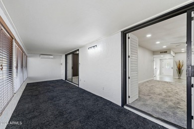 Ideally situated on a corner lot, this stunning home has on Leisure World Country Club in Arizona - for sale on GolfHomes.com, golf home, golf lot