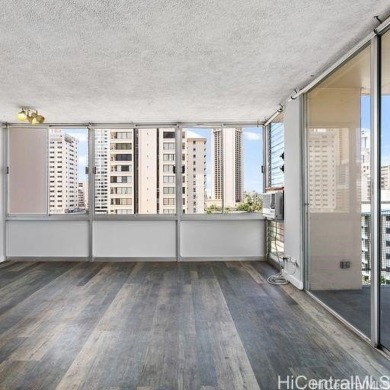 This charming condo has vinyl flooring in the unit with ceramic on Ala Wai Golf Course in Hawaii - for sale on GolfHomes.com, golf home, golf lot