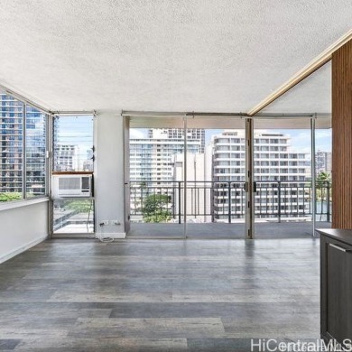 This charming condo has vinyl flooring in the unit with ceramic on Ala Wai Golf Course in Hawaii - for sale on GolfHomes.com, golf home, golf lot
