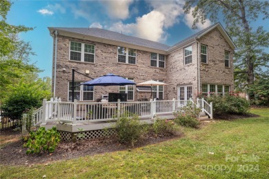 Lake living is calling you! This beautiful full brick stately on Westport Golf Club in North Carolina - for sale on GolfHomes.com, golf home, golf lot