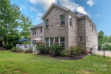 Lake living is calling you! This beautiful full brick stately on Westport Golf Club in North Carolina - for sale on GolfHomes.com, golf home, golf lot