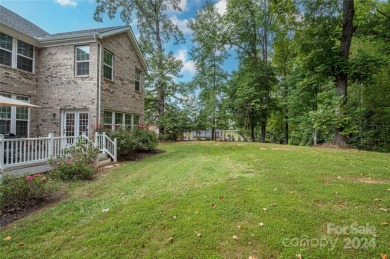 Lake living is calling you! This beautiful full brick stately on Westport Golf Club in North Carolina - for sale on GolfHomes.com, golf home, golf lot