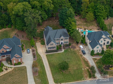 Lake living is calling you! This beautiful full brick stately on Westport Golf Club in North Carolina - for sale on GolfHomes.com, golf home, golf lot