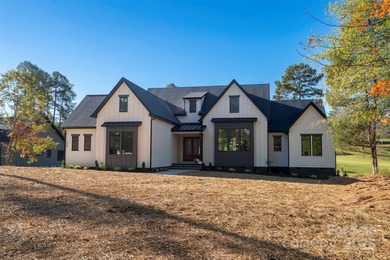 Experience refined living in this stunning new construction on River Oaks Country Club in North Carolina - for sale on GolfHomes.com, golf home, golf lot